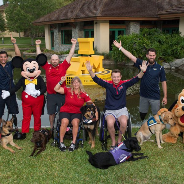 group of people with mickey mouse