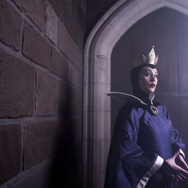 Evil Queen in spooky hallway