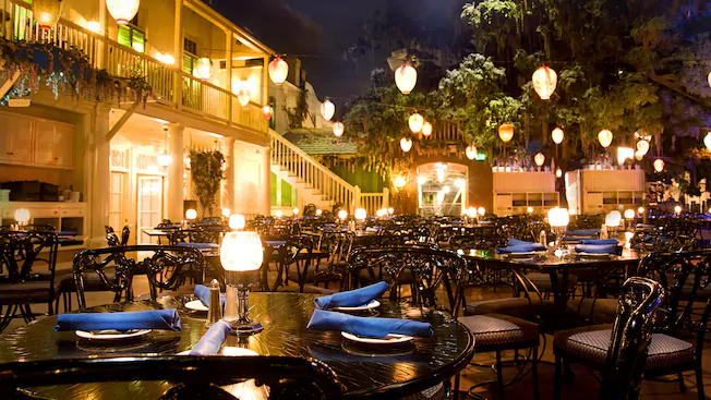 Blue Bayou indoor restaurant with lighted lanterns and tables