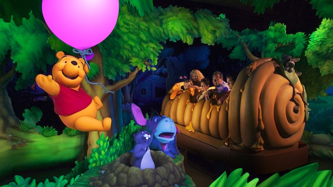 Inside of the Pooh attraction with Pooh and Eeyore