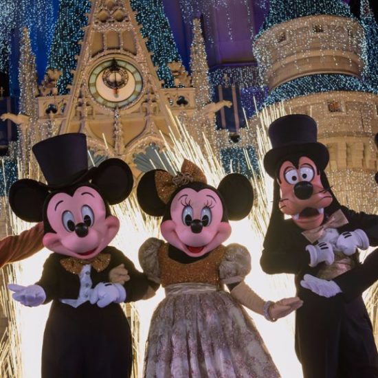 Walt Disney World characters dressed up for New Year's Eve