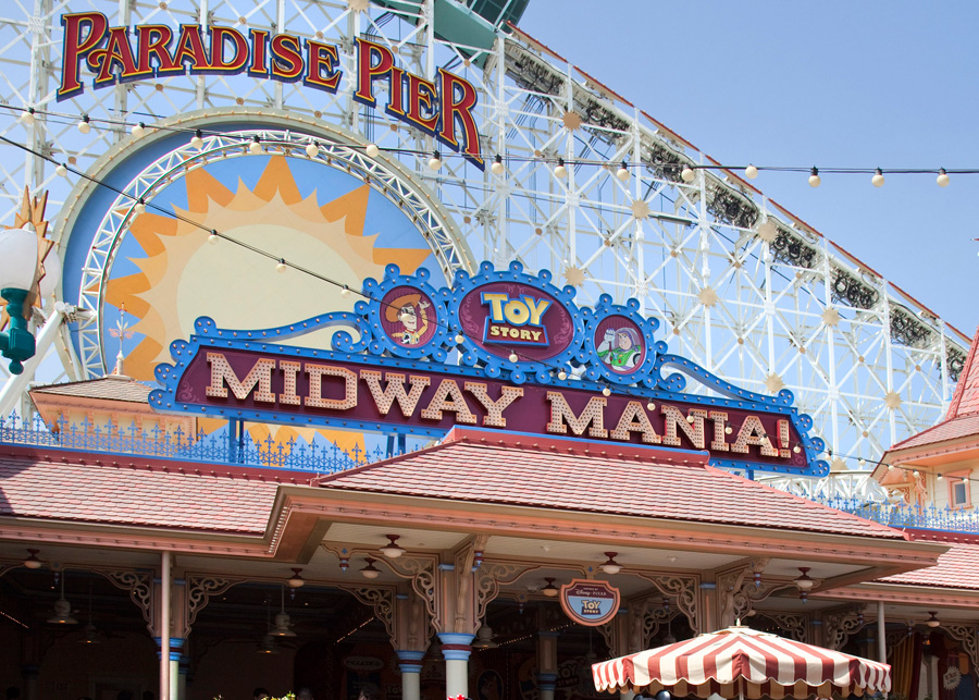 Toy Story Midway Mania outside view with Incredicoaster behind it