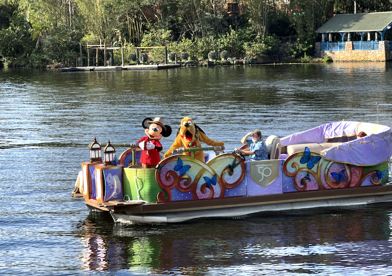 Disney World in March- Mickey and Pluto characters on boat