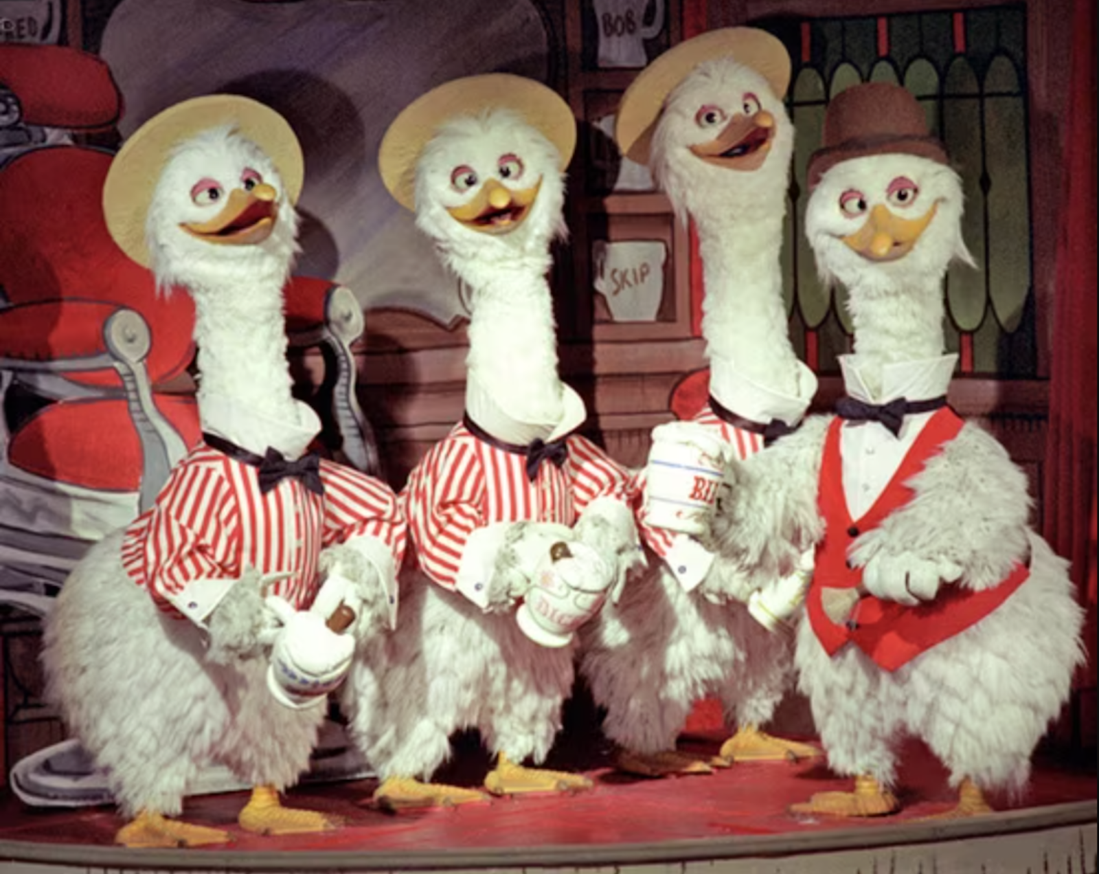 A cast of audio-animatronic animals sang music from America's history in this retired attraction.