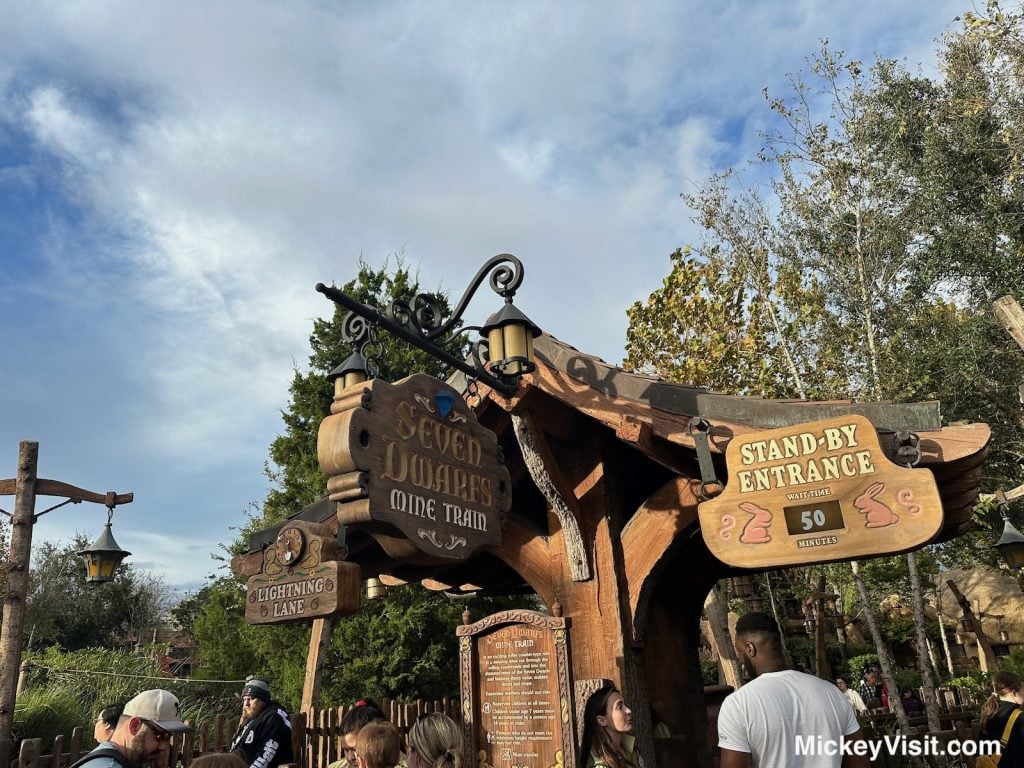 disney world lightning lane sign seven dwarfs