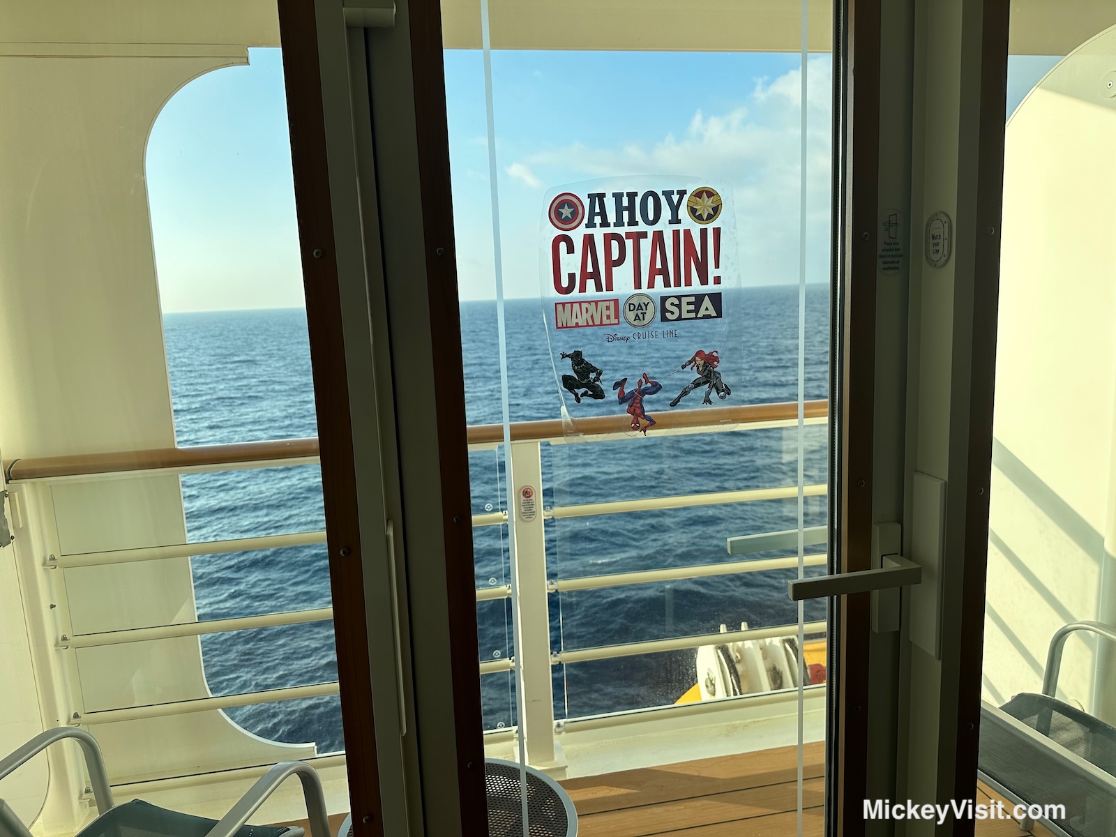Window with marvel day at sea sign
