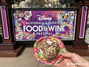 disney california adventure food and wine festival sign and mickey macaron