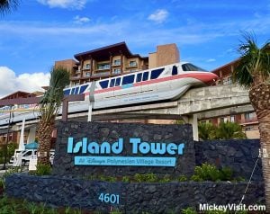 monorail passing by Island Tower at Disney's Polynesian Resort