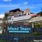 monorail passing by Island Tower at Disney's Polynesian Resort