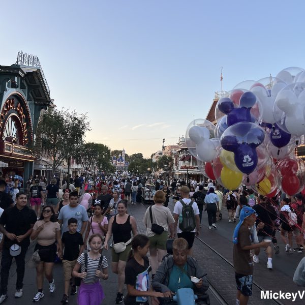 crowds on Disneyland Main Street U.S.A. early evening