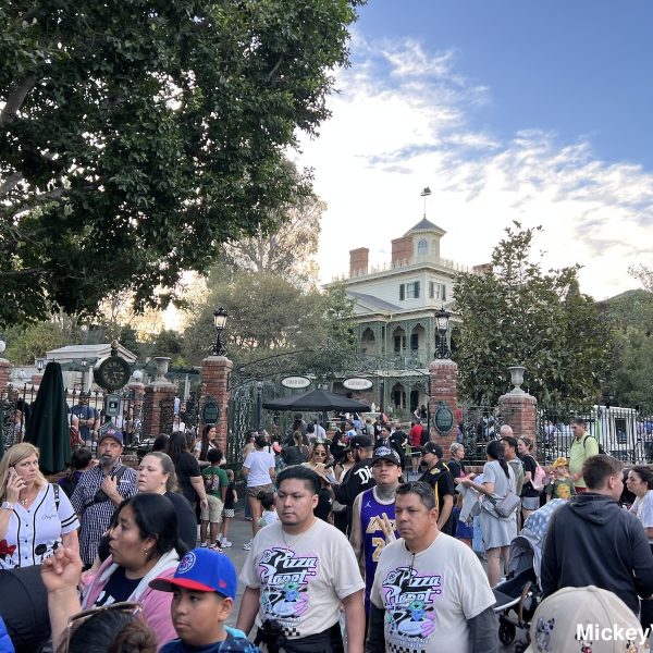 crowds at Disneyland Park in front of Haunted Mansion