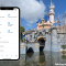 Disneyland castle and phone with Disneyland mobile app