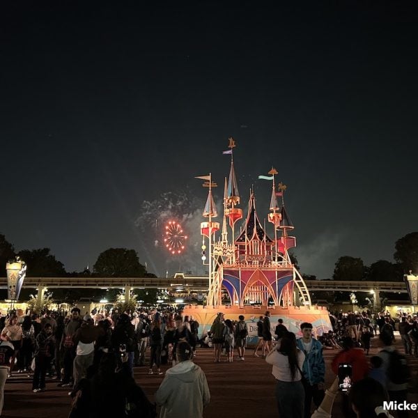 Disneyland esplanade 70th anniversary sculpture with fireworks