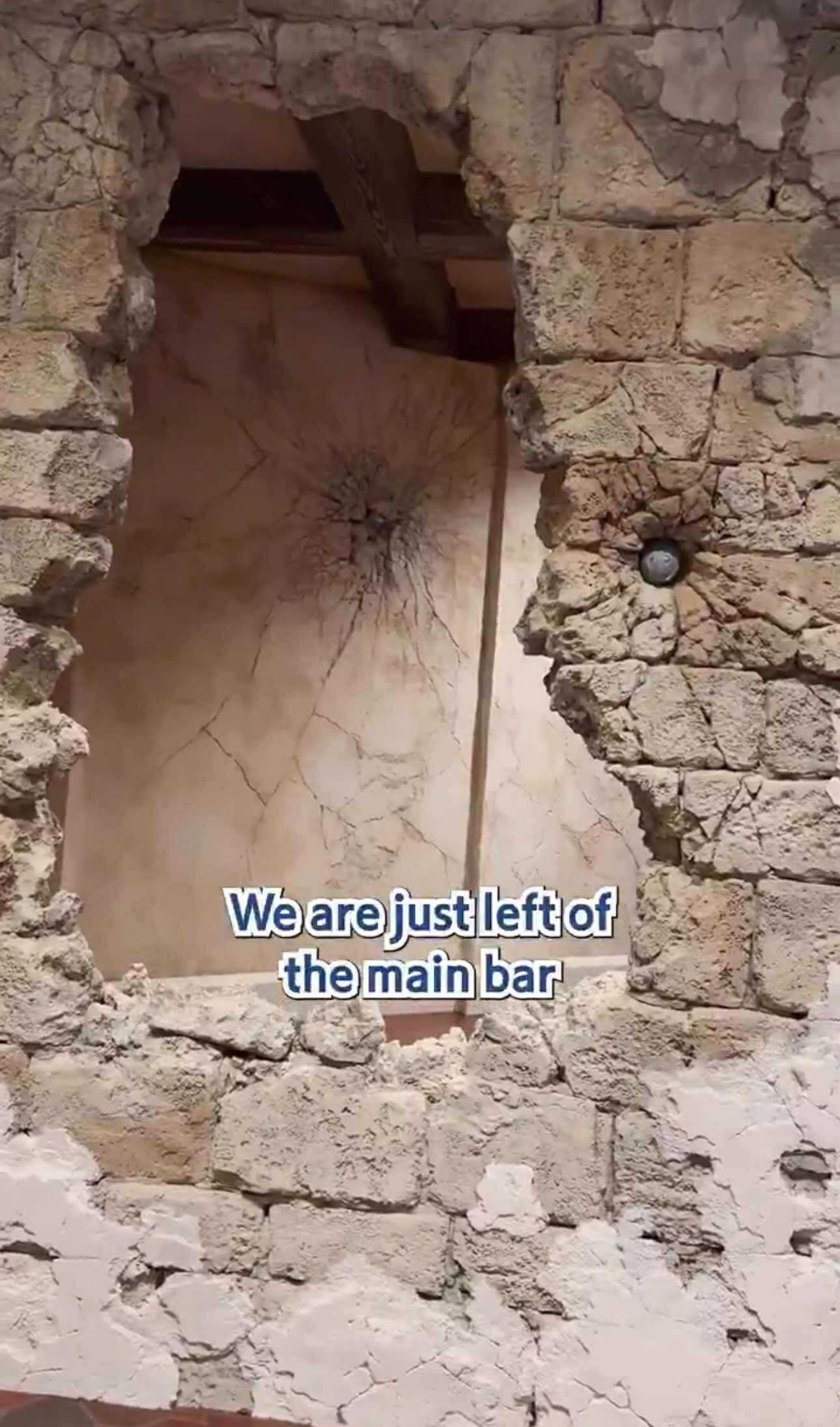 bullet holes in wall