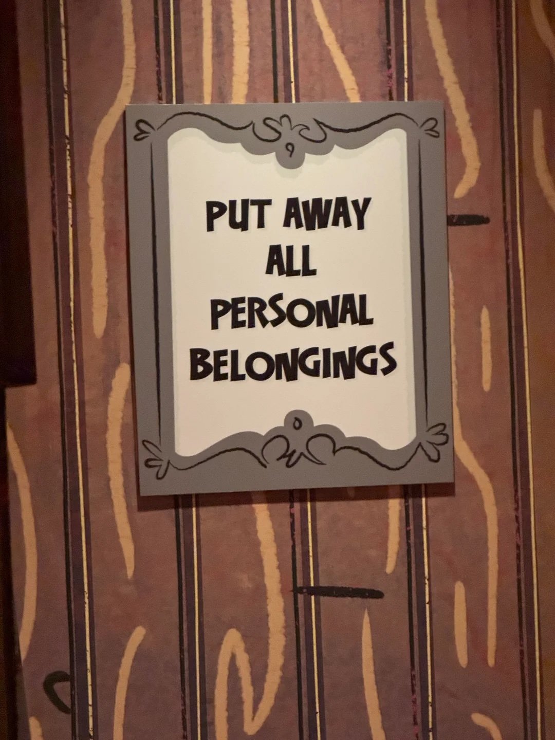 Mickey and Minnie's Runaway Railway personal belongings sign