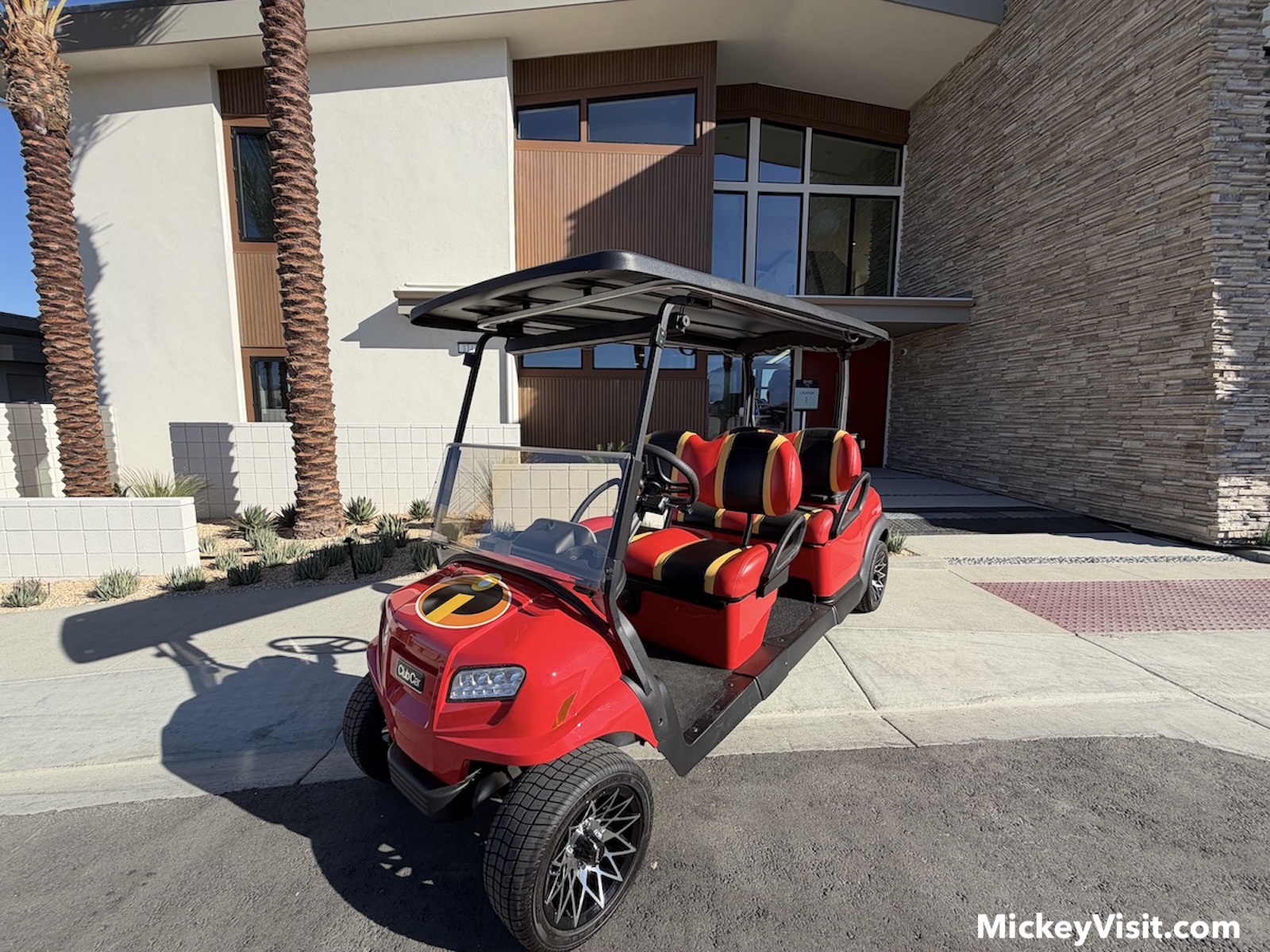 Incredibles golf cart outside Parr House