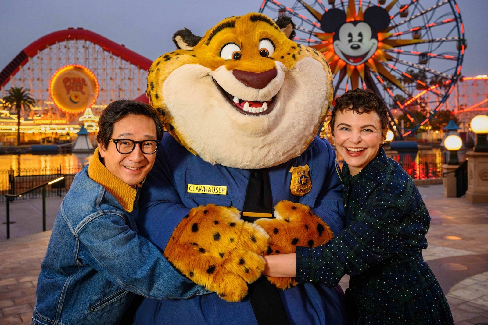 Ke Huy Quan and Ginnifer Goodwin pose with Clawhauser from “Zootopia 2”