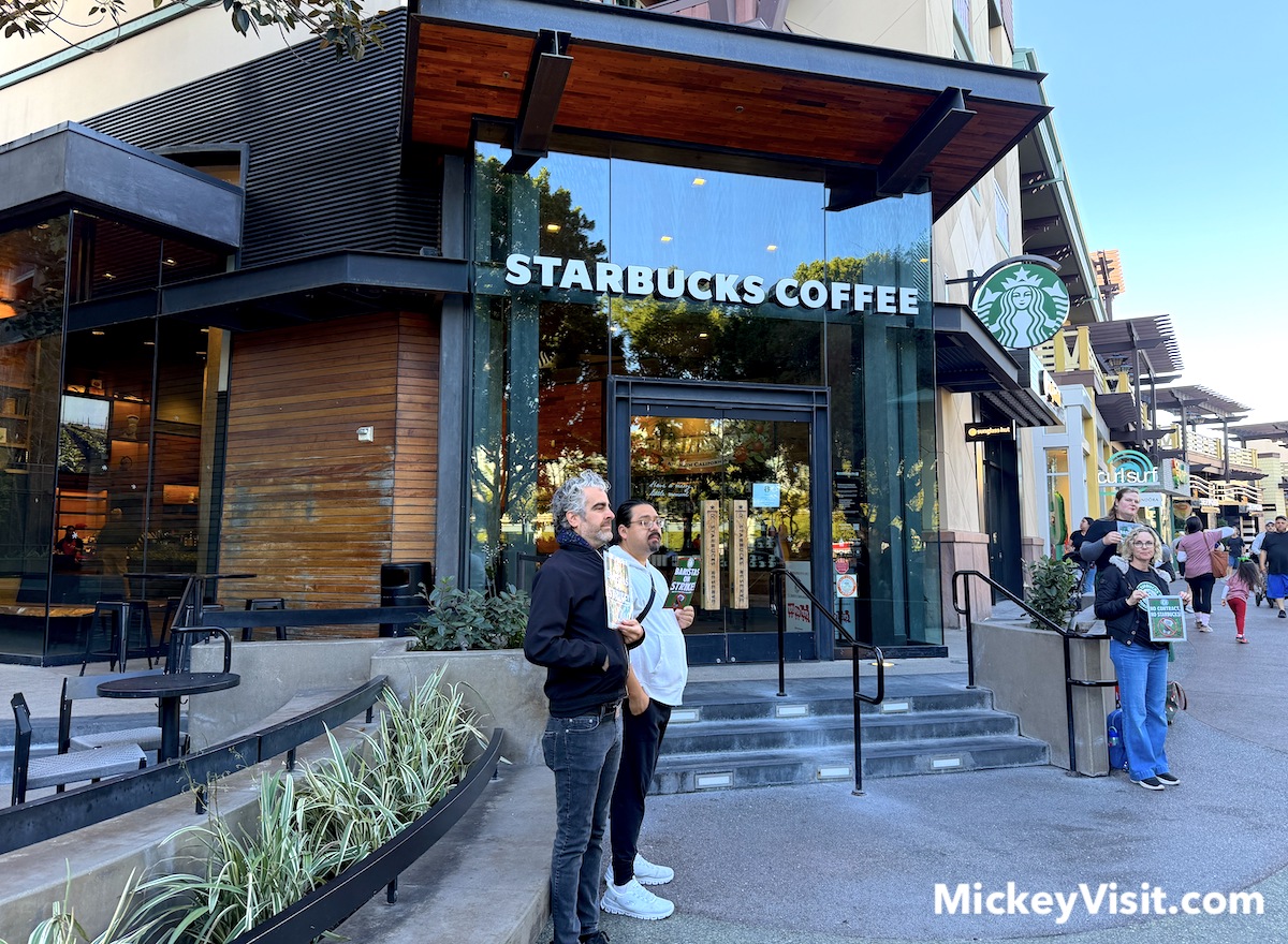 downtown disney starbucks location with striking baristas in front