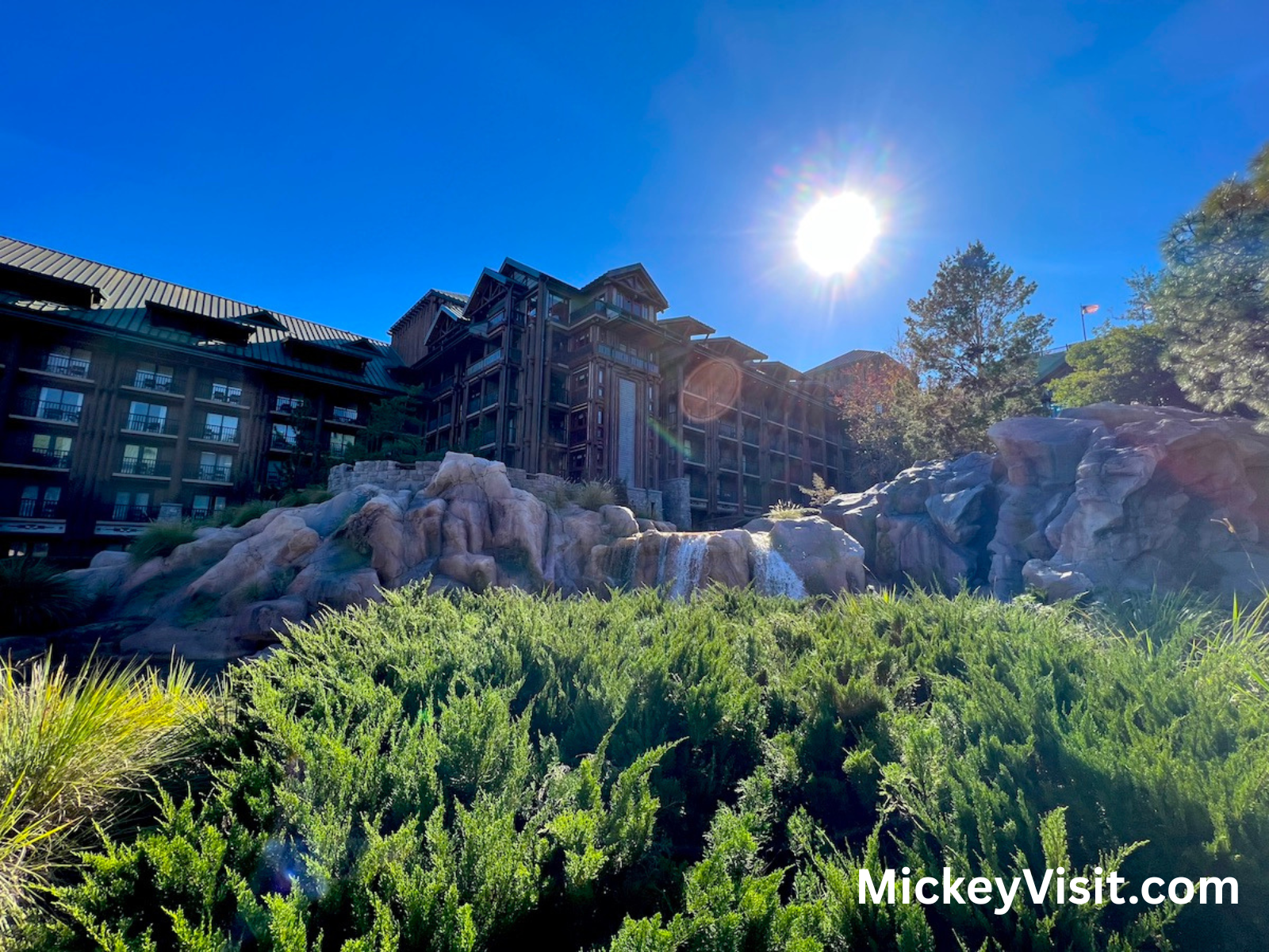 Wilderness Lodge with the sun above it
