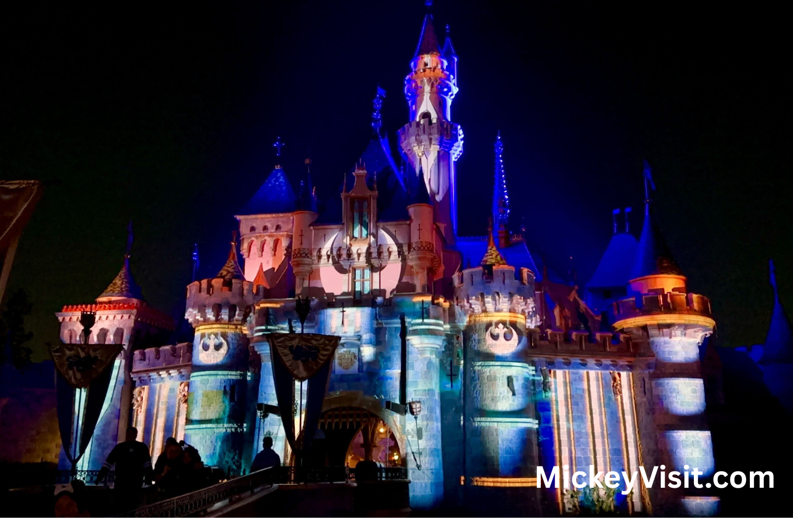 Disneyland castle lit up for Star Wars Nite