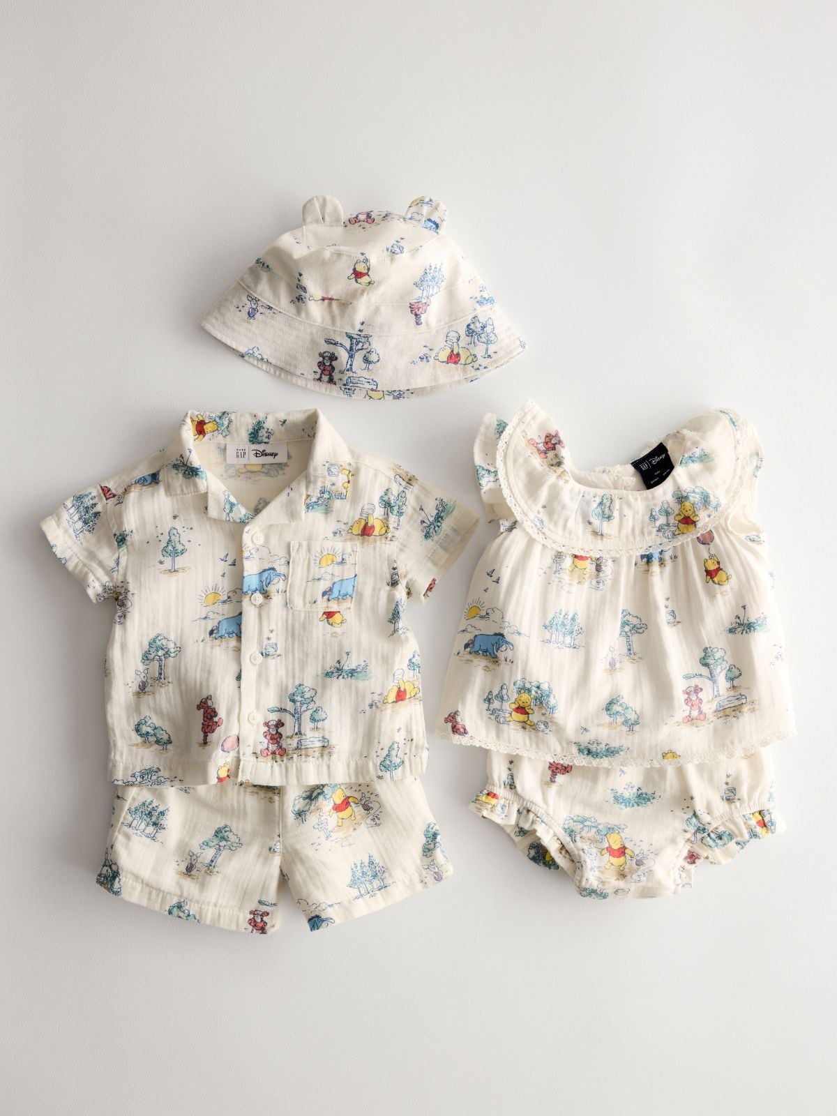 Matching set of baby apparel inspired by Winnie the Pooh from GAP