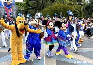 disneyland characters with marching band