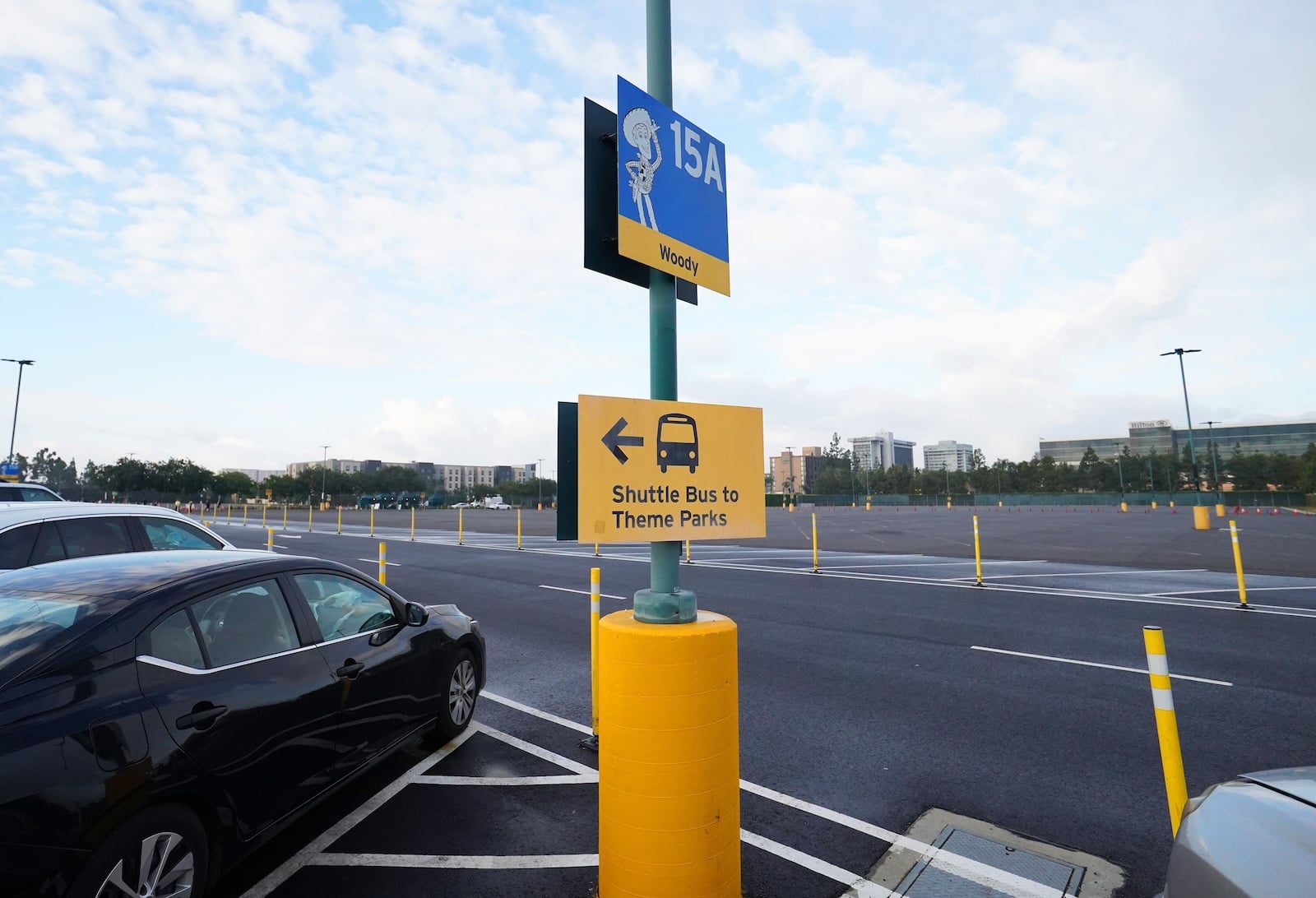 Disneyland parking lot shuttle system sign