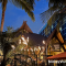 Exterior of Trader Sam's at nighttime