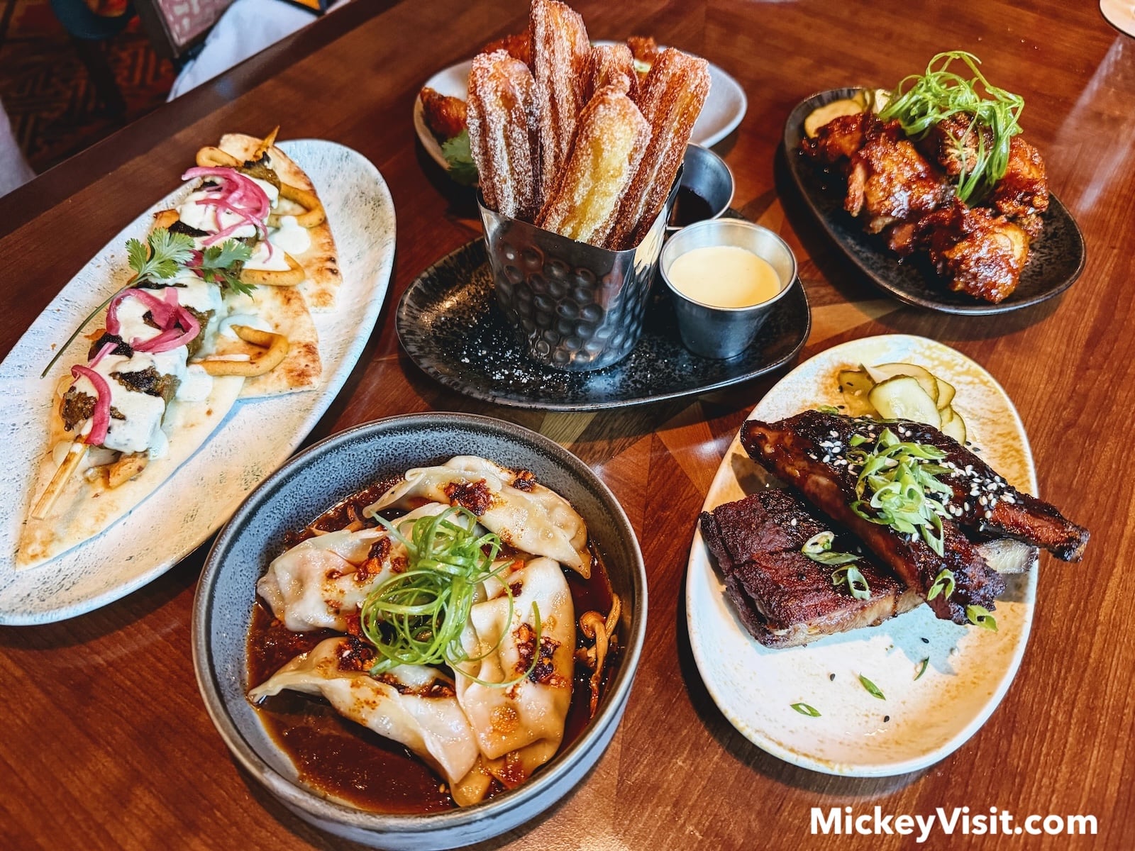 Dumplings, churros, wings, pork ribs, skewer