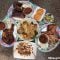 Table full of barbecue food