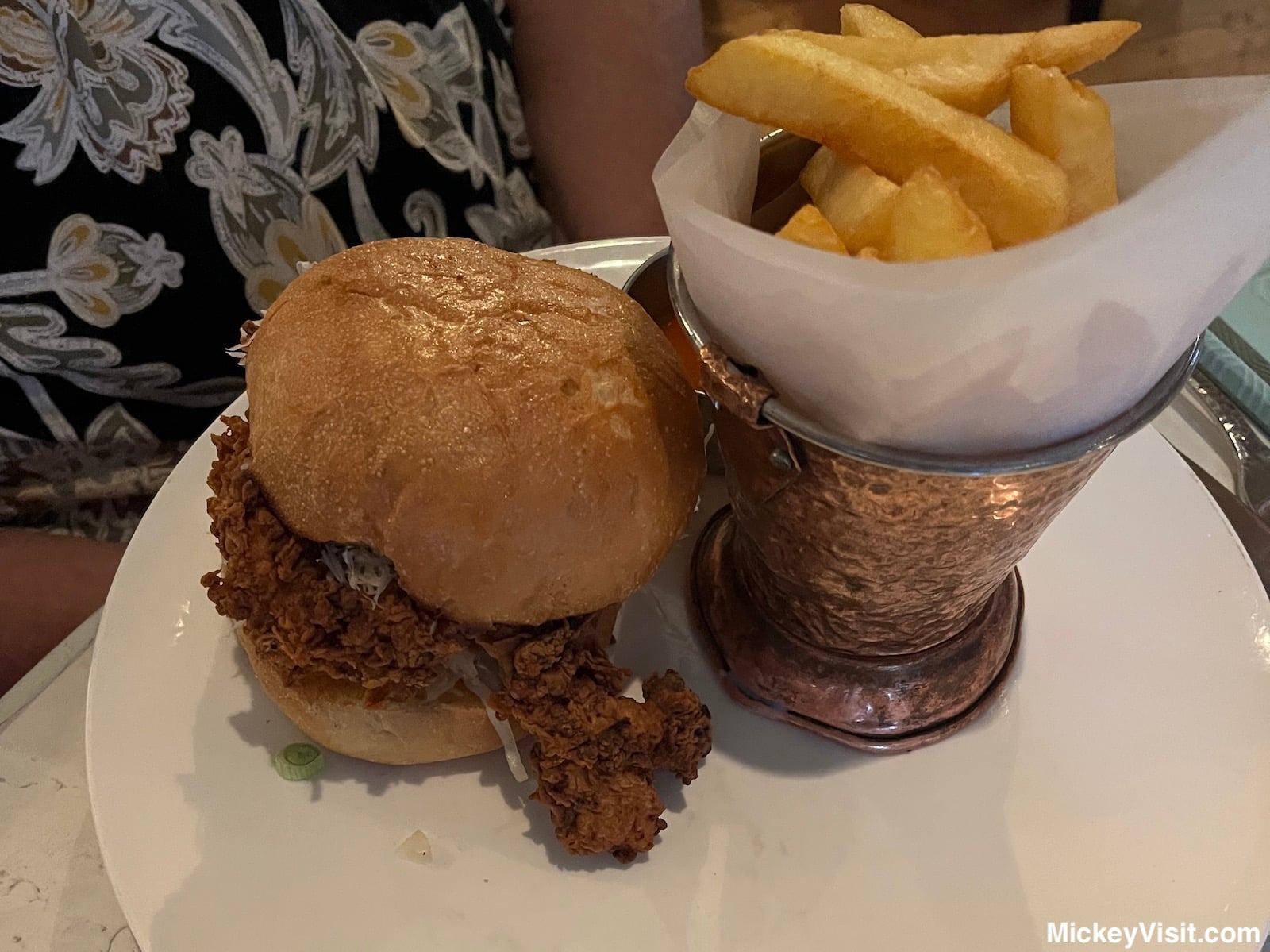 Spicy chicken sandwich with fries