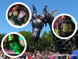 Maleficent dragon parade float surrounded by merchandise