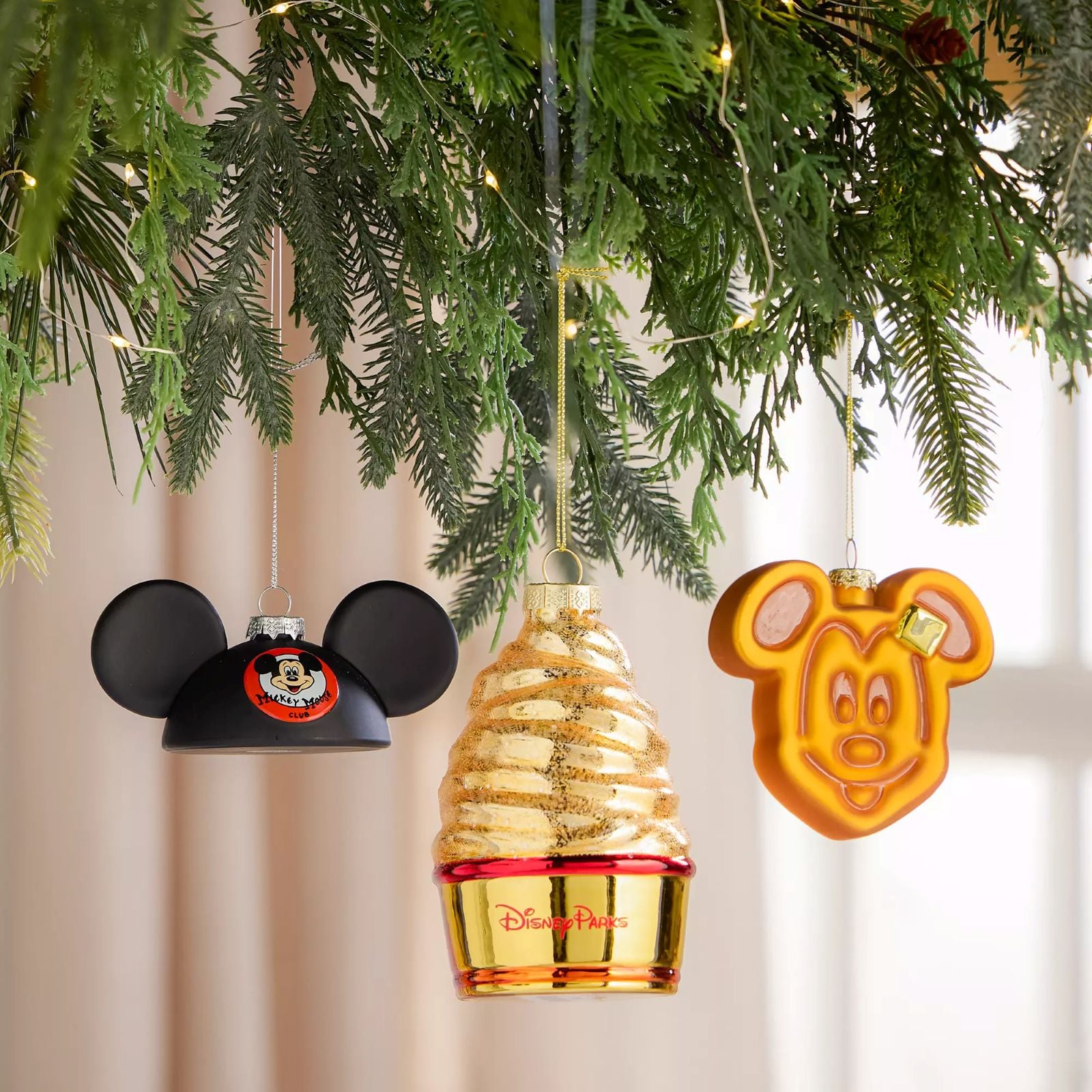Three new ornaments on a Christmas tree