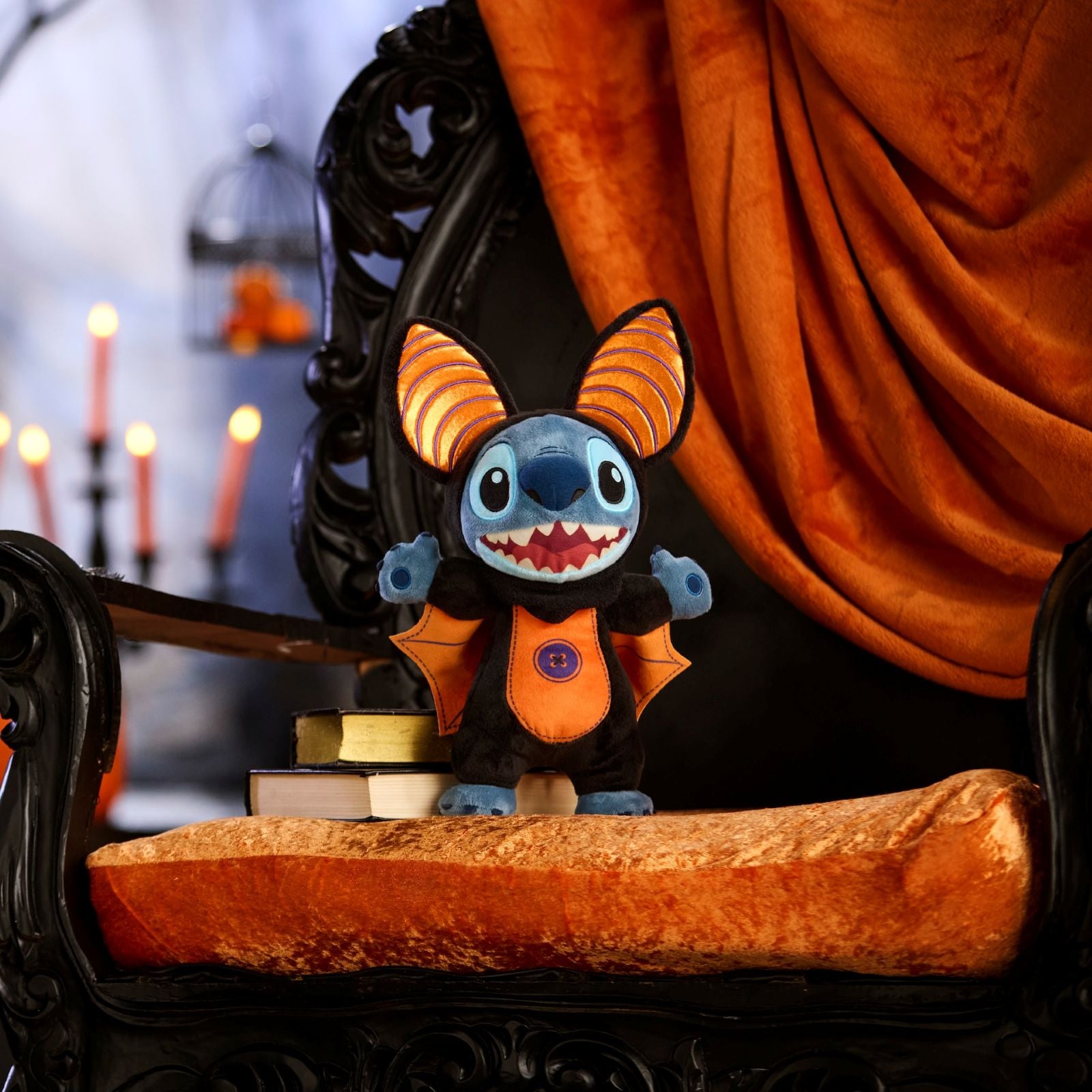 Stitch plush in a bat costume