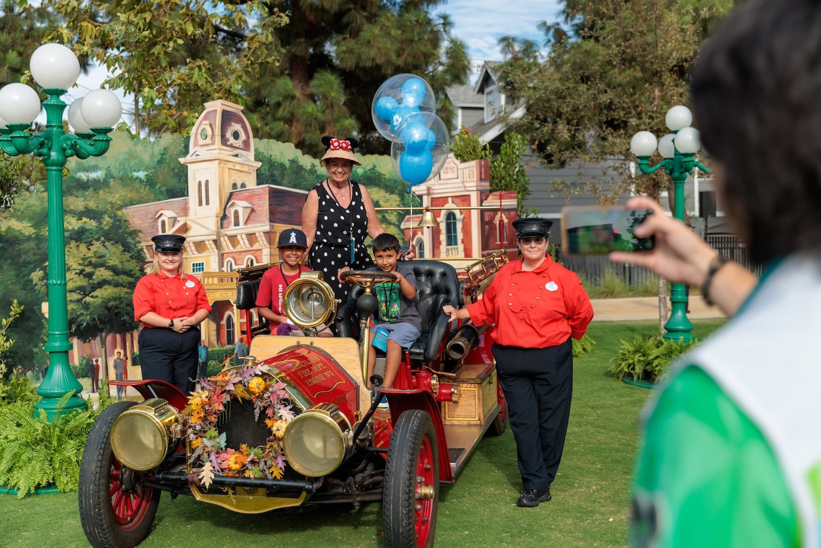 Family photo with Disneyland firetruck