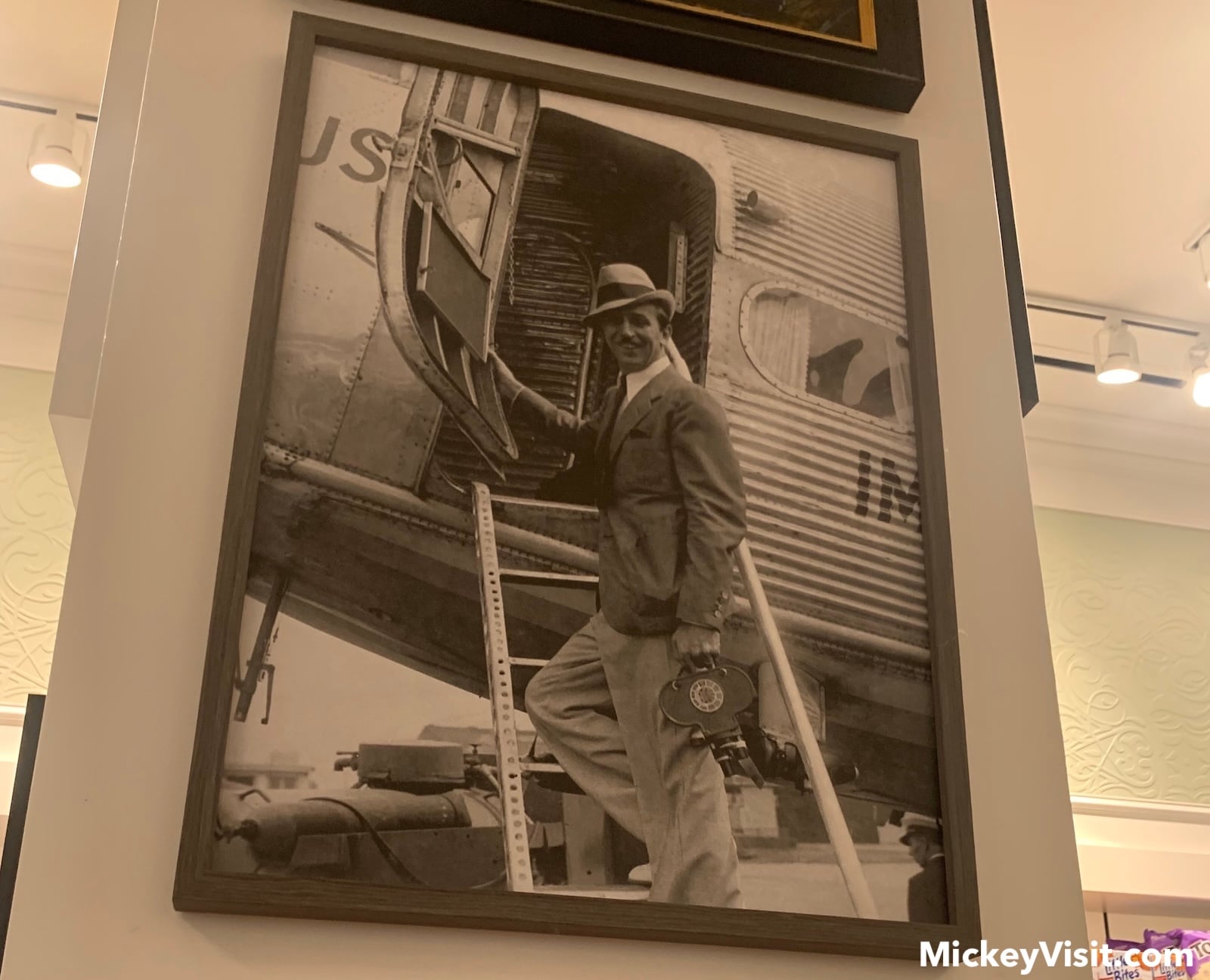 Photo of Walt Disney boarding a plane