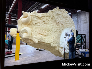 Imagineer working on part of new serpent animatronic