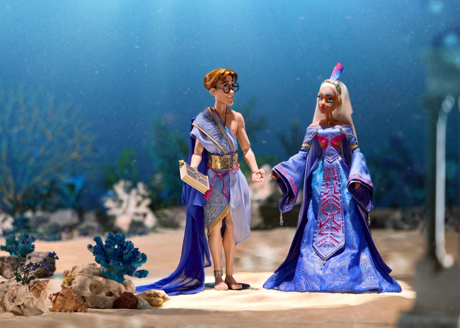 Dolls based on Milo Thatch and Princess Kida from Atlantis: The Lost Empire