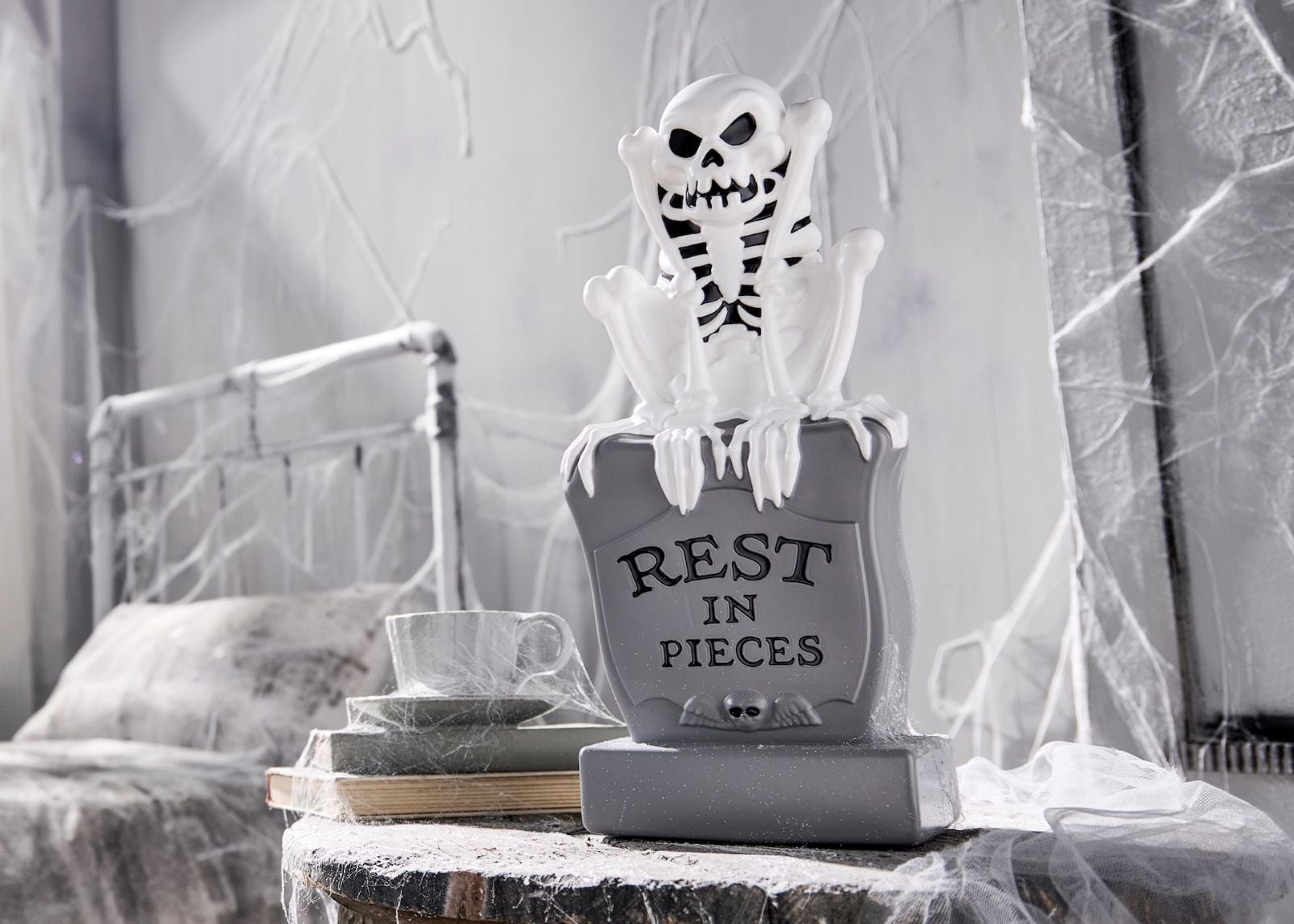 Skeleton Dance inspired light up figure on tombstone