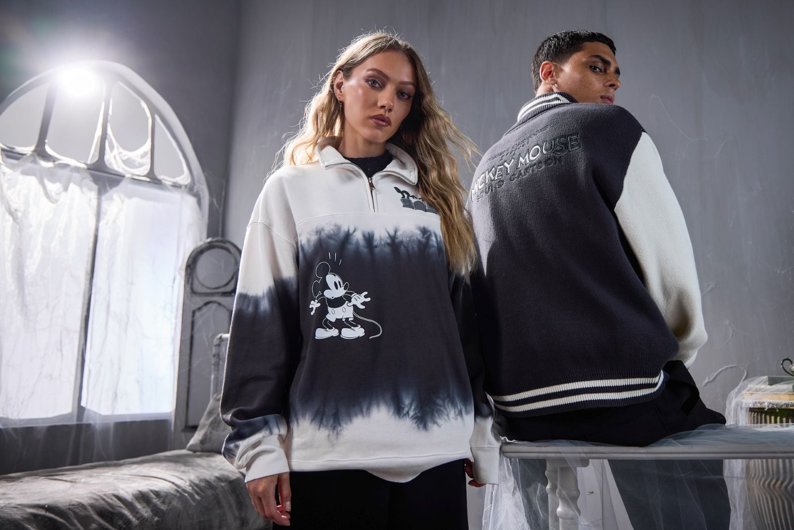 Two models wearing the Skeleton Dance merchandise collection