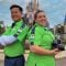 PhotoPass Cast Members in front of Magic Kingdom Cinderella Castle