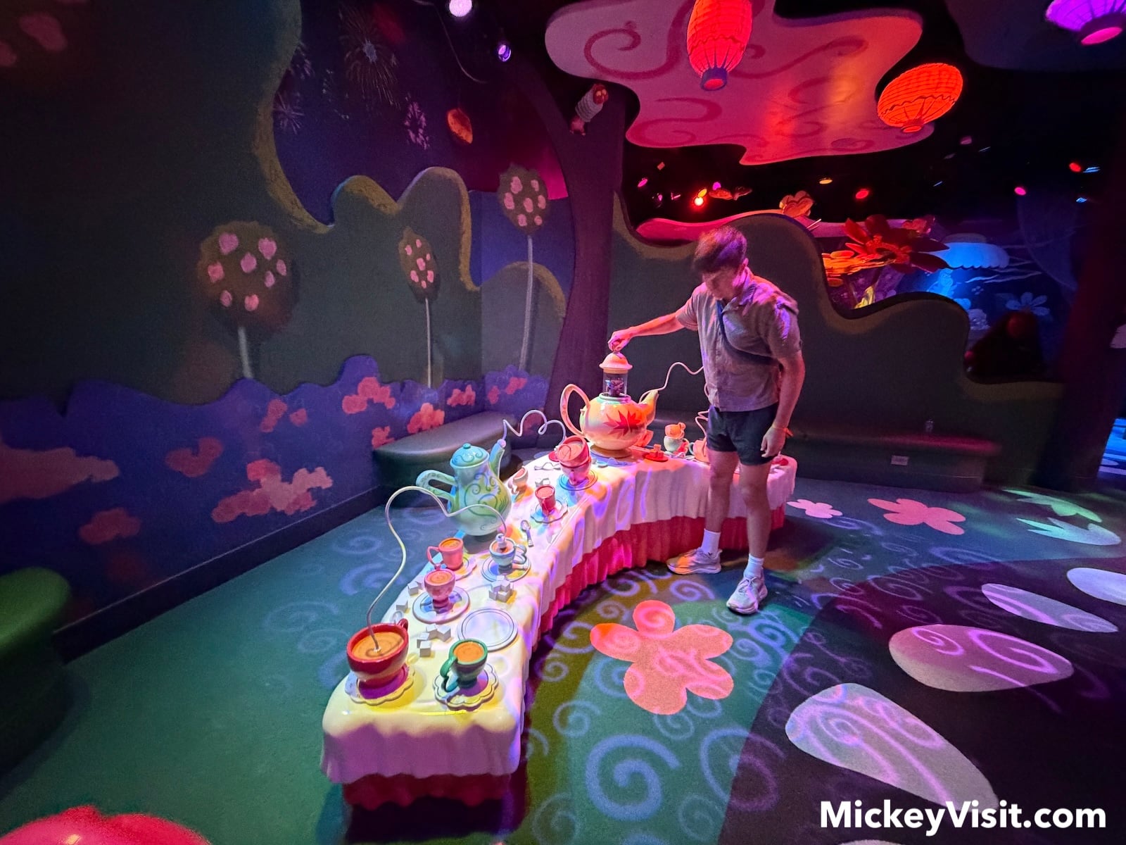 Alice in Wonderland playground with blue and pink lighting