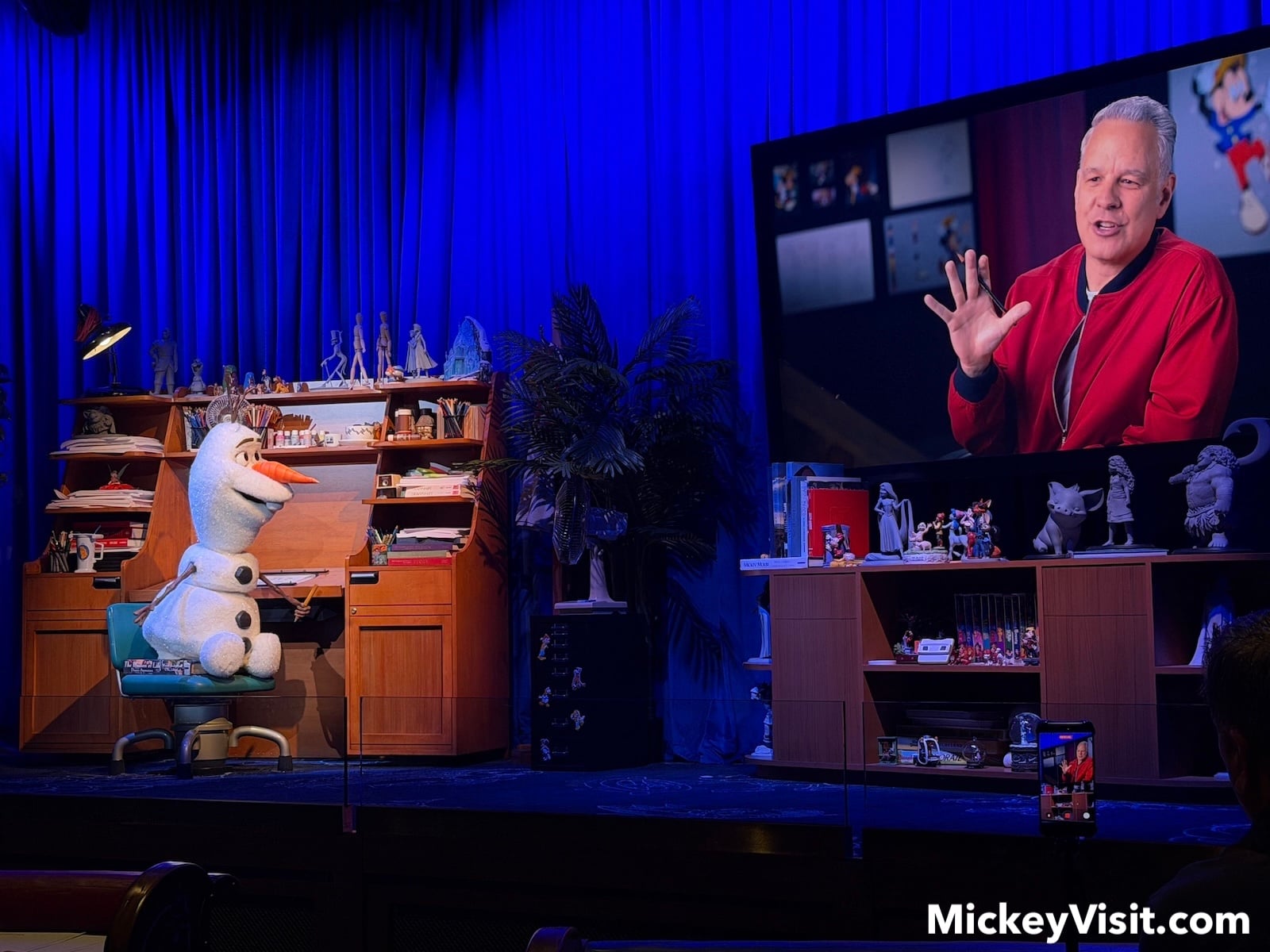 Olaf Audio-Animatronics figure on stage at animation desk