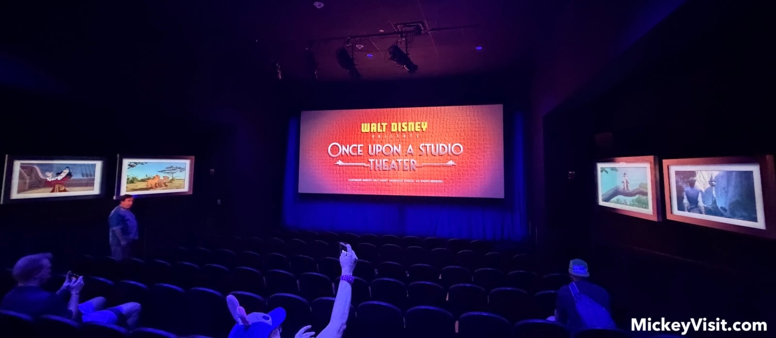 Theater screening room with animation artwork on walls