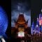 Spaceship Earth, Chinese Theatre façade, and Cinderella Castle at night
