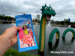 Disney Springs guide map in front of Lego sea dragon