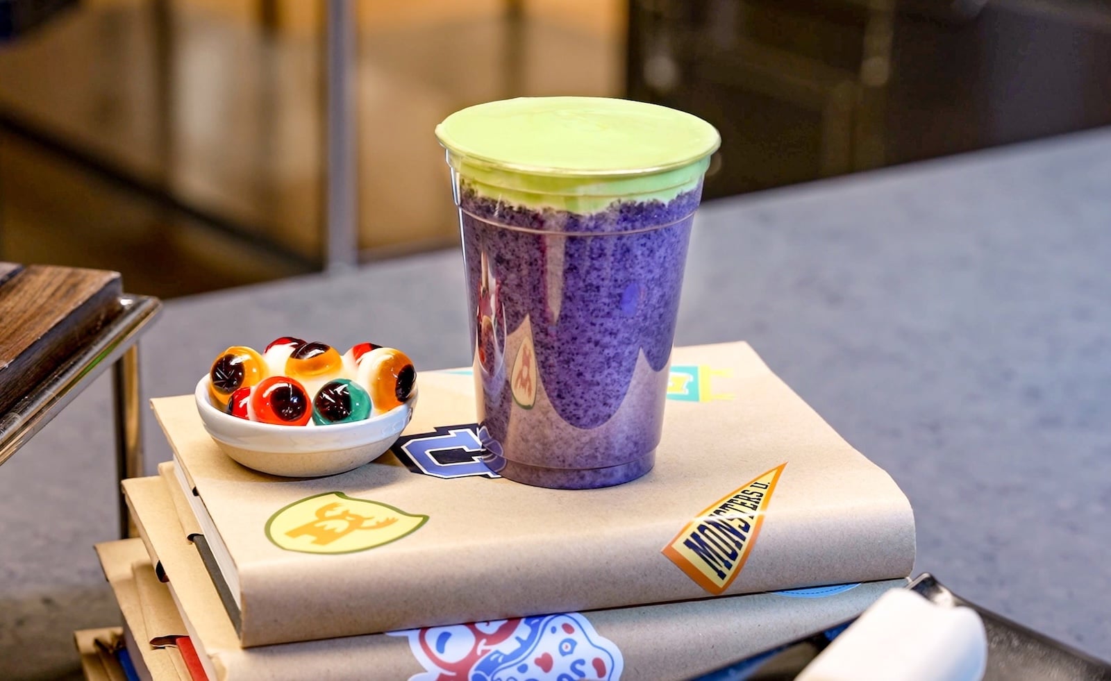 Purple drink with green foam