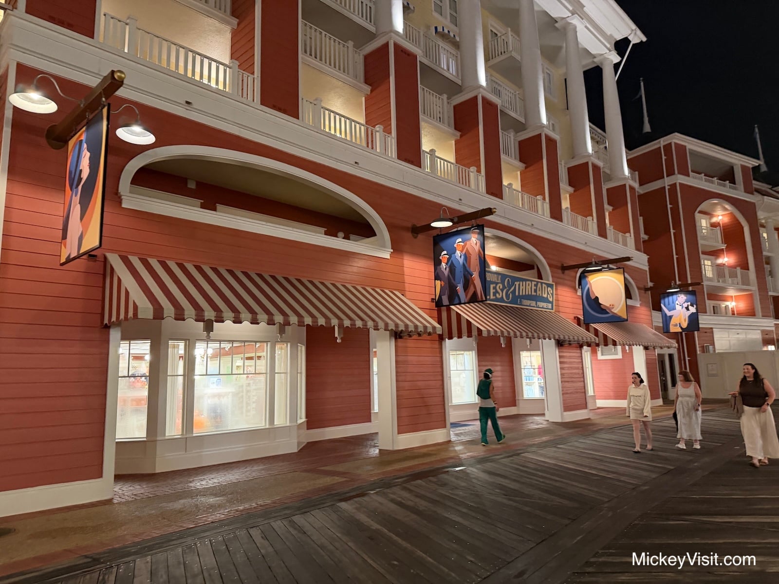 A storefront on Disney's BoardWalk at night.