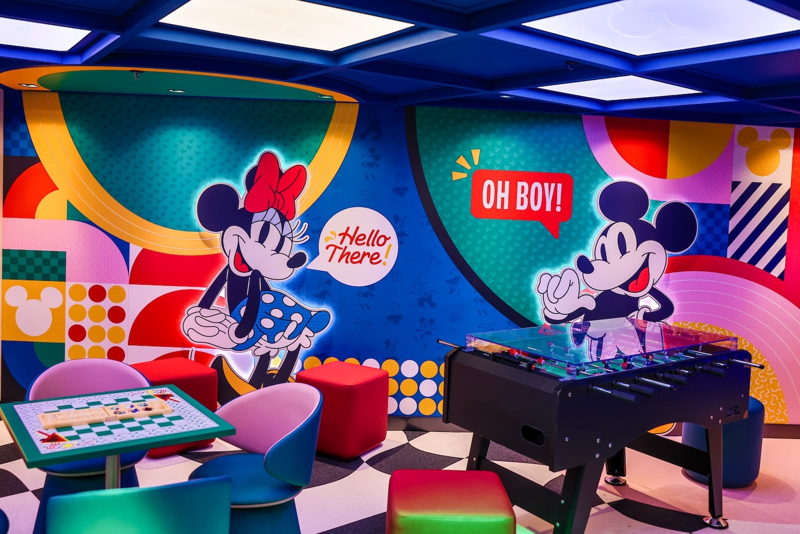 Hangout space with wall illustrations of Minnie Mouse and Mickey Mouse