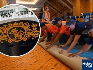 Workers performing maintenance on cruise ship